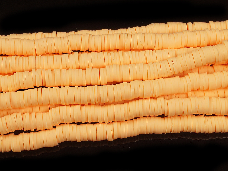 Каучуковые бусины спейсеры "Персик". Диаметр отверстия 2,5 мм. Длина нити примерно 39 см, примерно 390 бусин. Размеры бусин усреднены. Цена указана за нить.
