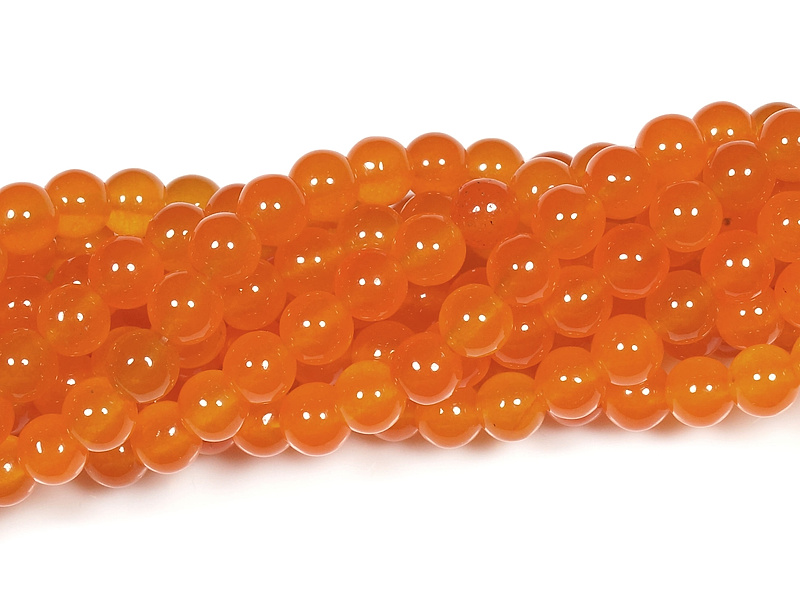 Бусины оранжевого кальцита (тонированный кварц). Диаметр отверстия - 1 мм. Размеры, вес, длина и количество бусин на нити указаны примерно.
