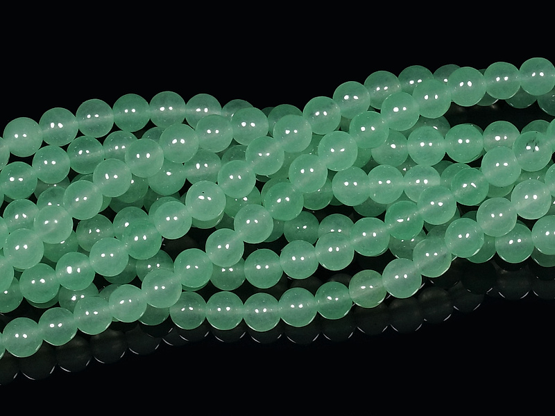Бусины зеленого авантюрина (тонированы). Диаметр отверстия - 0.8мм. Размеры, вес, длина и количество бусин на нити указаны примерно.
