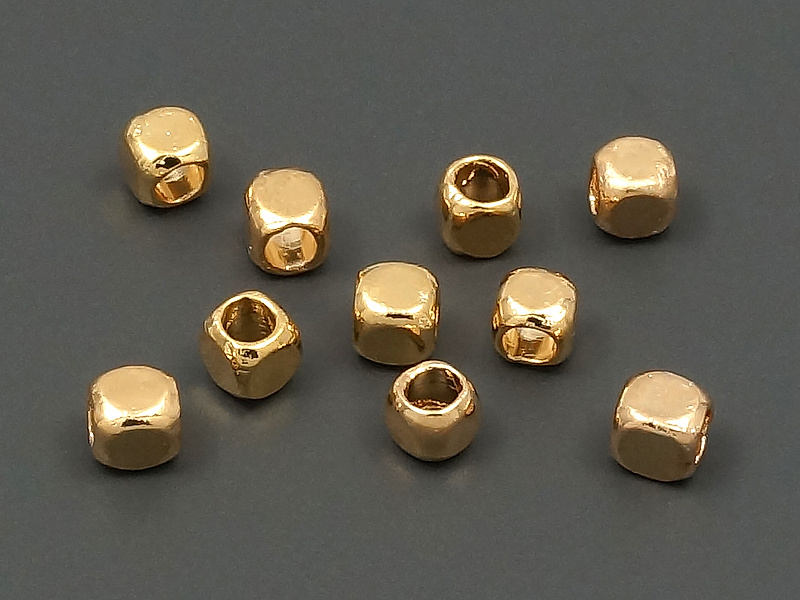 Бусина-разделитель для создания бижутерии (украшений). Покрытие - золото 14К. Диаметр отверстия - 1.3 мм.
