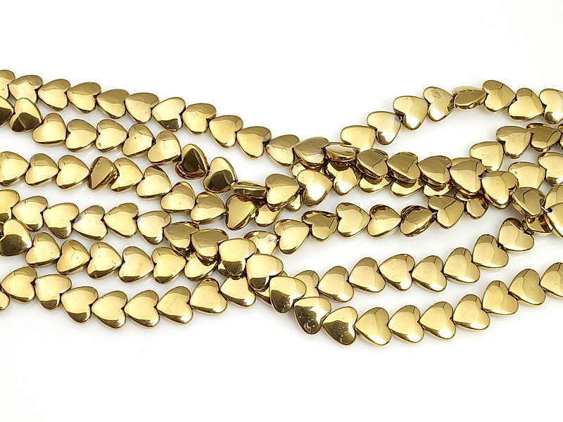 Бусины гематита сердечко золото (гематин). Диаметр отверстия 0.8 мм. Размеры вес, длина и количество бусин  на нити указаны примерно. Микровыемки.
