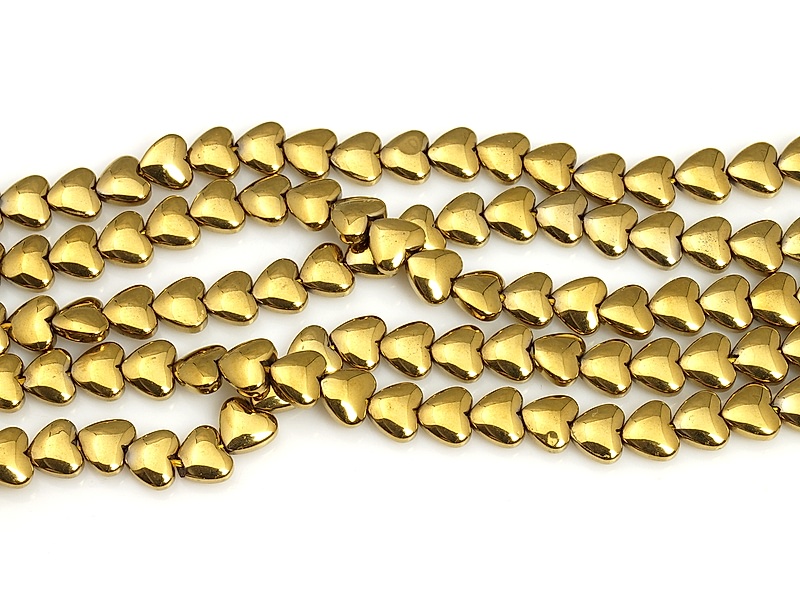 Бусины гематита сердечки  золото (гематин). Диаметр отверстия 0.8 мм. Размеры вес, длина и количество бусин  на нити указаны примерно. Микровыемки.
