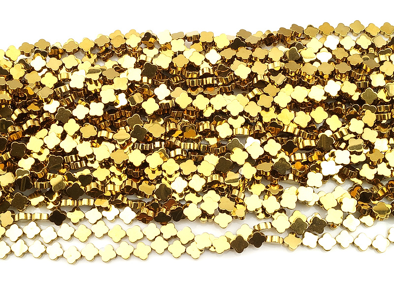 Бусины гематита клевер золото (гематин). Диаметр отверстия 0.8 мм. Размеры, вес, длина и количество бусин на нити указаны примерно. Мелкие выемки.
