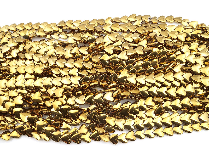 Бусины гематита сердечко золото (гематин). Диаметр отверстия 0.8 мм. Размеры вес, длина и количество бусин  на нити указаны примерно. Мелкие выемки.
