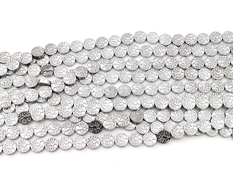 Бусины гематита монетки "Древо жизни" серебро (гематин). Диаметр отверстия 1 мм. Размеры, вес, длина и количество бусин на нити указаны примерно. Микровыемки.
