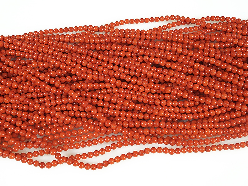 Бусины красного коралла