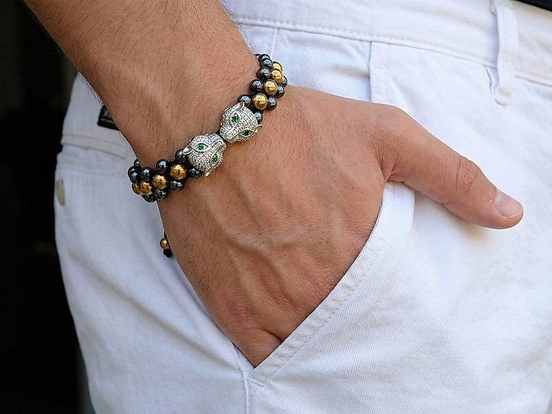 Набор материалов "Мужской плетеный браслет с пантерами"