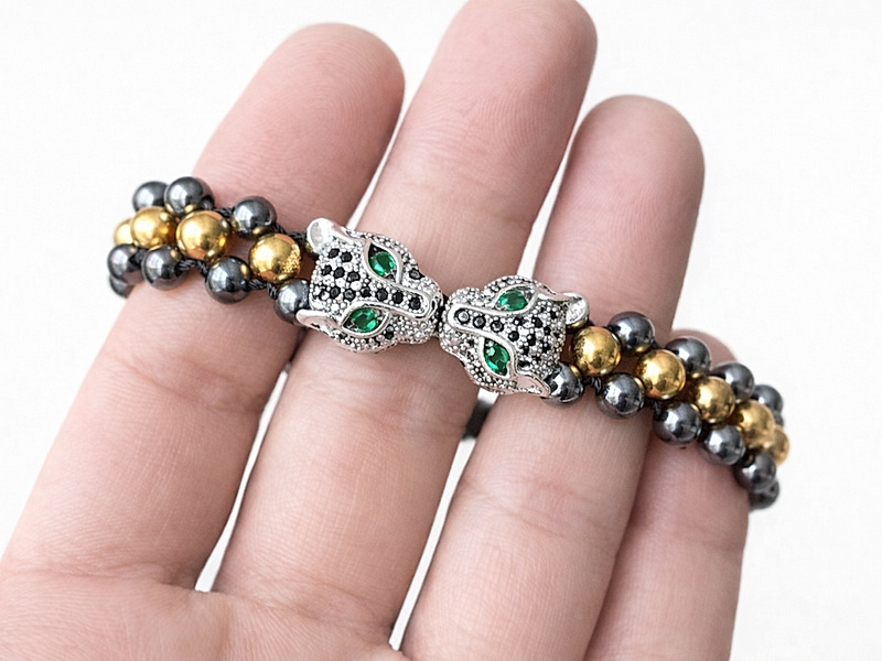 Набор материалов "Мужской плетеный браслет с серебряными пантерами"