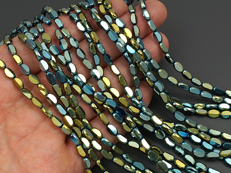 Граненые стеклянные бусины овалы зеленый, желтый 7x4x3мм