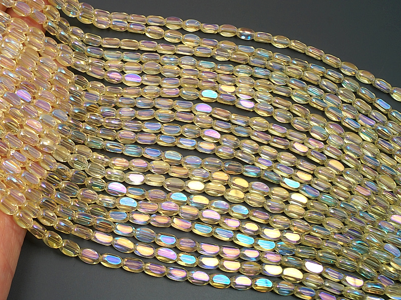 Граненые стеклянные бусины овалы "Желтый радужный цитрин"