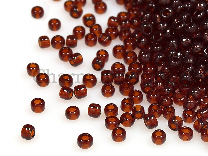 Бисер Toho, размер 11/0. Цвет #5D (Прозрачный, гранат). Цена указана за 10 грамм. Производитель - Япония.  | Интернет-магазин товаров для рукоделия