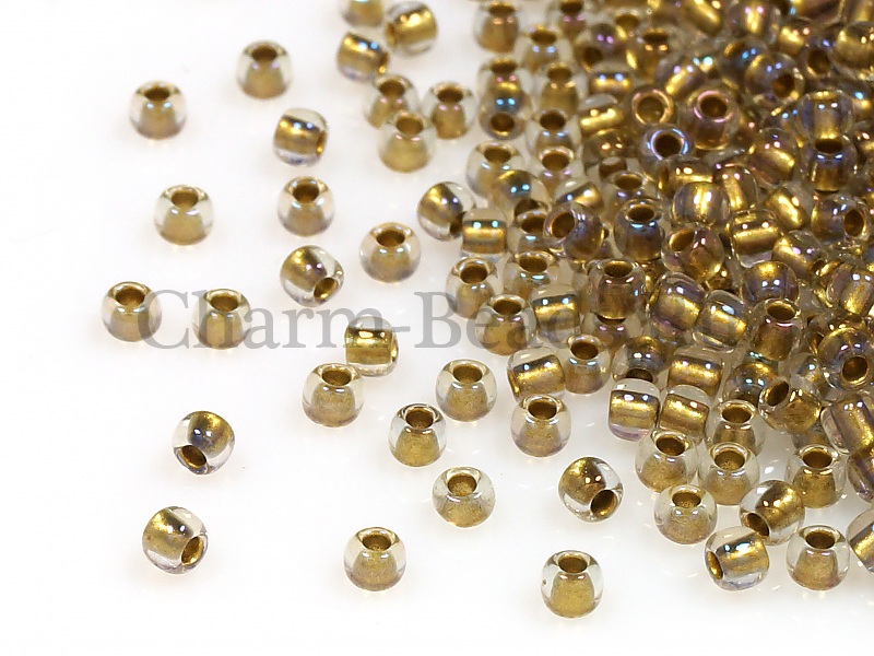 Бисер Toho, размер 11/0. Цвет #262 (Окрашенный изнутри, хрусталь/золото). Цена указана за 10 грамм. Производитель - Япония. | Интернет-магазин товаров для рукоделия