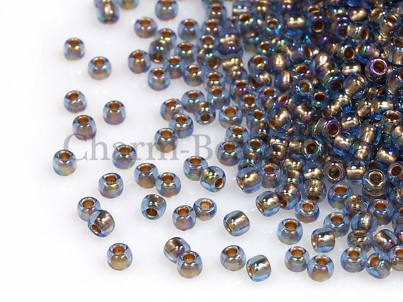 Бисер Toho, размер 11/0.  Цвет #997 (Внутренняя позолота, радужный светлый сапфир). Производитель - Япония. Цена указана за 10 грамм. | Интернет-магазин товаров для рукоделия