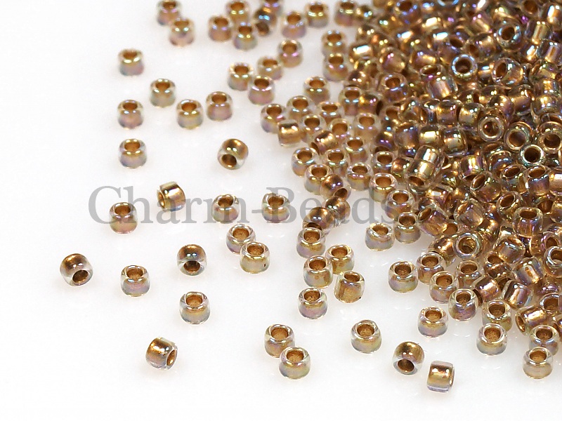 Бисер Toho, размер 11/0. Цвет #994 (Внутренняя позолота, радужный хрусталь). Цена указана за 10 грамм. Производитель - Япония. | Интернет-магазин товаров для рукоделия