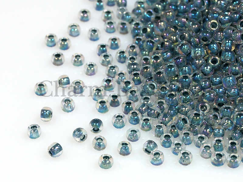 Бисер Toho, размер 15/0. Цвет #773 (Окрашенный изнутри, радужный, хрусталь/монтана). Цена указана за 10 грамм. Производитель - Япония. | Интернет-магазин товаров для рукоделия