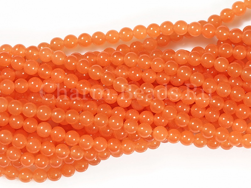 Бусины оранжевого кварца, тонированы. Диаметр отверстия 1 мм. Размеры, вес, длина и количество бусин на нити указаны примерно.
