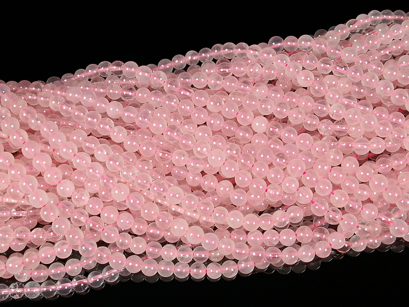 Бусины розового кварца. Диаметр отверстия 0.6 мм. Размеры, вес, длина и количество бусин на нити указаны примерно.
