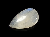 Кабошон лунного камня с участками голубой иризации.  Погрешность измерения 0, 5 - 1 мм. Изредка встречаются микровыемки. 
