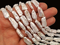 Бусина пресноводного натурального жемчуга бива (культивированного) в форме продолговатой палочки. Яркий перламутр. На отдельных бусинах могут встречаться наплывы перламутра и выемки природного происхождения. Производитель - Южный Китай. Цена указана за штуку. , фото №105444