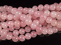 Бусины розового кварца. Диаметр отверстия 1 мм. Размеры, вес, длина и количество бусин на нити указаны примерно.

