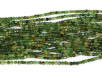 Граненые бусины зеленого турмалина верделита, каменный бисер. Диаметр отверстия 0.6 мм. Размеры, вес, длина и количество бусин на нити указаны примерно.
