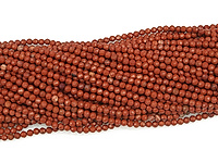 Граненые бусины красной яшмы. Диаметр отверстия 0.6 мм. Размеры, длина нити и количество бусин на нити указаны примерно.
