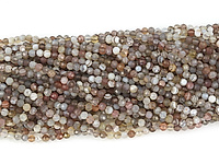 Граненые бусины ботсванского агата, каменный бисер. Диаметр отверстия 0.5 мм.
