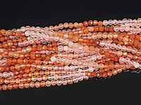 Граненые бусины розового кварца и сердолика, градиент цветов. Каменный бисер. Диаметр отверстия 0.4 мм. Размеры бусин и вес усреднены, длина нити указана примерно.
