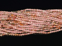 Граненые бусины розового и рутилового  кварца, каменный бисер. Диаметр отверстия 0.4 мм. Размеры, вес, длина и количество бусин на нити указаны примерно.
