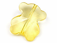 Подвеска "Желтый мишка" из цветного пластика. Диаметр продольного отверстия 2 мм. Могут встречаться внутренние включения и незначительные царапины на поверхности. Цена указана за штуку.
