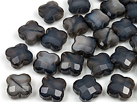 Пара стеклянных бусин "Черно-серый клевер" для создания украшений. Диаметр продольного отверстия 1.2 мм. Цена указана за пару.
