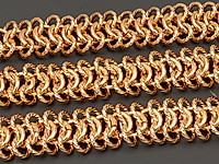 Ювелирная цепочка с плетением питон для создания бижутерии (украшений). Покрытие - золото 14К. Ширина цепочки - 9 мм. Высота - 3.2 мм. Размер основного (центального) звена - 5.5x1 мм, не замкнуто.&nbsp;
, фото №153820