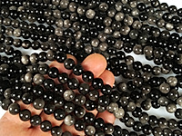 Бусины серебристого обсидиана. Месторождение - Армения. Диаметр отверстия 1 мм. Размеры, вес, длина и количество бусин на нити указаны примерно. Точнее замеряем по требованию. Геометрия бусин - земной шар.
, фото №157457