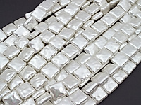 Бусины барочного жемчуга белый квадрат. Диаметр отверстия 1 мм. Размеры, вес, длина и количество бусин на нити указаны примерно. Точнее замеряем по требованию. Мелкие выемки.
, фото №161386