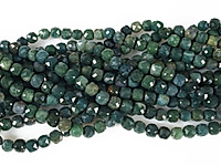 Граненые бусины кубики мохового агата (моховой халцедон). Месторождение - Индия. Диаметр отверстия 1 мм. Размеры, вес, длина и количество бусин на нити указаны примерно. Мелкие выемки.
, фото №162316