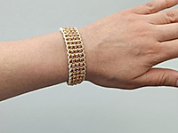 Набор материалов для сборки многорядного золотого парчового браслета с использованием цепочки ролло, шнура и стразовой цепи. Замочек с удлинителем позволяет регулировать длину. Цвет шнура, размеры и цвет цепочки ролло, как и страз, можно поменять на любые другие.

Мастер - класс, как собрать парчовый браслет, ЗДЕСЬ.


Как и с чем носить

Браслет подходит для тех, кто любит бохо стиль и женственные образы. Носите его с легкими платьями, свободными блузами, льняными рубашками. Он красиво смотрится с серебряными сережками, кольцами и многослойными украшениями.



&nbsp;
, фото №163484