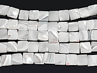 Бусины квадраты белого перламутра. Месторождение - Индонезия. Диаметр отверстия 0.4 мм. Размеры, вес, длина и количество бусин на нити указаны примерно. Точнее замеряем по требованию. Природные неровности.
, фото №163970