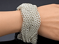 Набор материалов для браслета с ювелирными цепочками "Питон", заплетенными в косичку. Концы косичек крепятся к соединительным колечкам, на которые далее собираем замочек карабин.
&nbsp;
, фото №164173