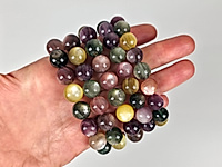 Микс бусин лилового, желтого лепидолита и зеленого мусковита c красивой иризаций. Месторождение - Бразилия.  Диаметр отверстия 1.1 мм. Размеры и вес бусин усреднены. Точнее замеряем по требованию. Микровыемки, природные шероховатости.
, фото №164197