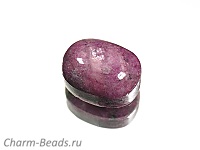 Кабошон корунда. Место добычи - Бразилия. Мелкие выемки. Погрешность измерения 0,5 - 1 мм.
