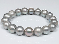 Браслет с натуральным речным жемчугом барочной формы. Основа - двойная резинка. В браслете 18 бусин с усредненным диаметром размером 10.5х9 мм. Длина в нерастянутом виде 17.5 см. На бусинах могут встречаться природные неровности и неоднотонный цвет. Цена за 1 браслет., фото №84191